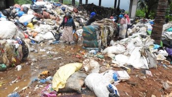 Women workers engaged in dry waste baling at Sonsodo toil without basic safety amenities