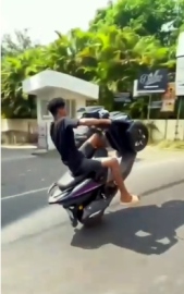 Youth’s stunt goes viral, police arrest father and son