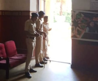 Cops at MMC building in anticipation of activists' visit