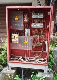 Exposed electrical service pillar poses danger to motorists, pedestrians