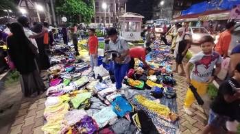 Migrant hawkers make brisk business as authorities turn a blind eye to illegalities