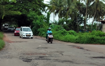 Motorists battle potholes on key Calangute road