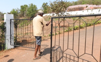 With no road access at kabrastan site, consultant suggested bridge connecting main road