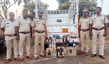 Liquor seized in Mollem, 1 held
