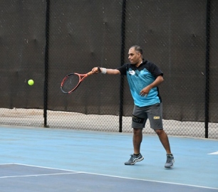 Ganesh pips Caetano to advance in men’s singles event