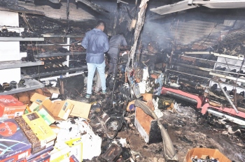 Property gutted in footwear shop blaze