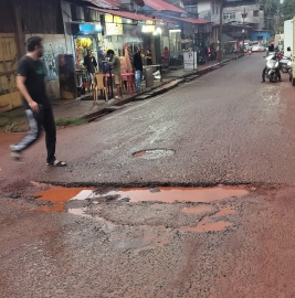 Motorists and pedestrians struggle as Angod’s roads left in ruins