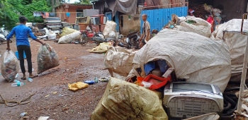 Areal villagers call for clearing scrap spilling on roads from yards