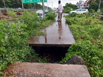 Drain openings along road near GMC pose threat