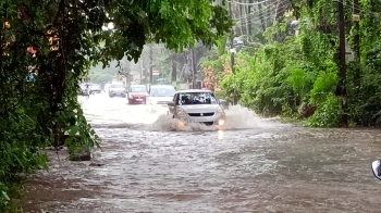 Traffic affected as Agassaim market road submerged