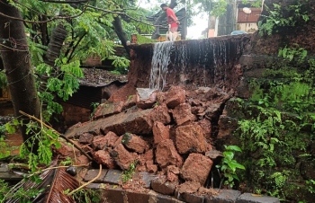 Overflowing manhole causes wall collapse in Agalli