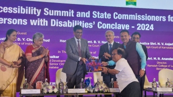 CJI releases coffee table book on International Purple Fest