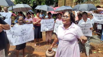 Locals protest to demand repair of bad road in Siolim