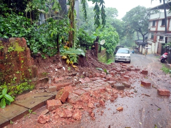 Roadside retaining wall collapses in Curti