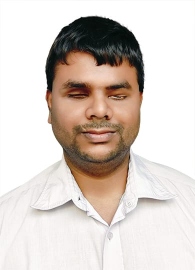 Born with eyes shut, this music lover enjoys playing harmonium