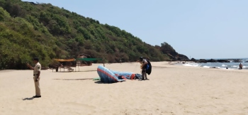 8 tourists detained for paragliding sans licence at Keri Beach