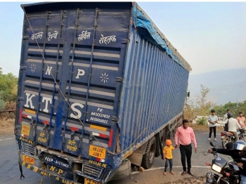 Traffic disrupted as container truck gets stuck at Tillari Ghat