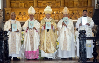 Priests, laity express unity with Archbishop at Chrism Mass