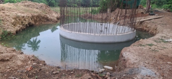 Unfenced pond around sewerage tank poses risk to humans, animals