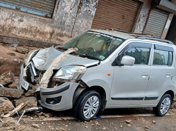 Margao slab collapse: Narrow escape for minor boy as cars crushed by debris
