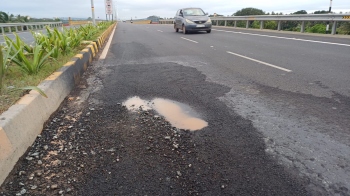 Work begins, but questions unanswered on how western bypass stretches on embankments developed potholes