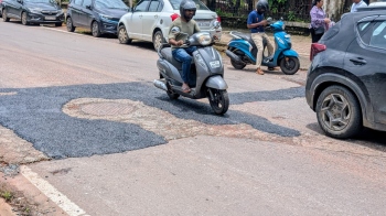 Respite from rain prompts authorities to patch up roads