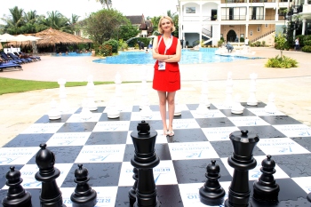 A chess queen doffing many a hat “ Charlize van Zyl