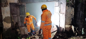 Fire personnel douse fire at godown in Gandhi market
