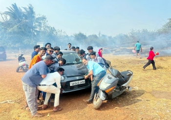 Amona locals, students save vehicles from fire