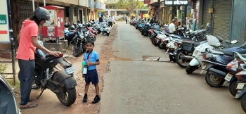 One year on, Mapusa commuters still navigate stone-filled lanes