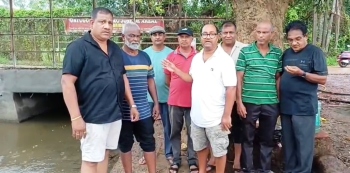 Areal locals step in to repair damaged culvert near historic bridge in village
