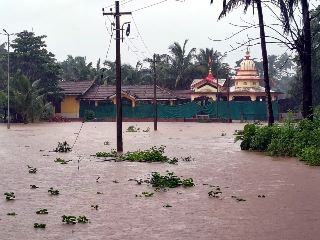 Floodwater surrounds Pali Temple Guleli-Murmune...