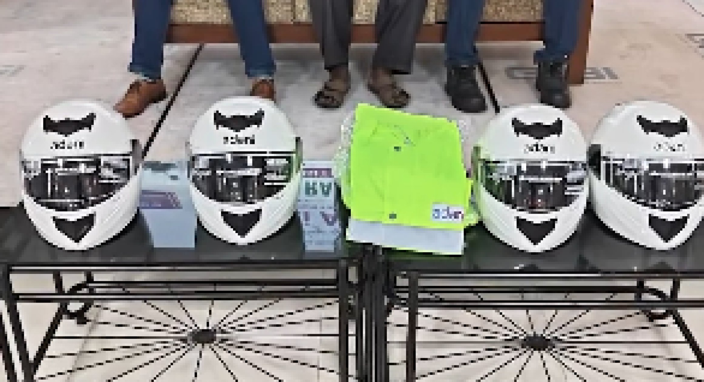 Raincoats, helmets distributed to Mormugao motorcycle pilots