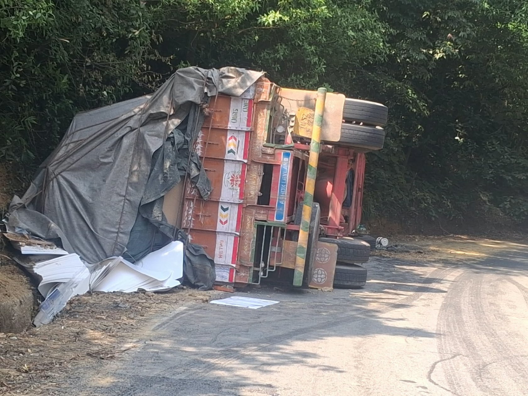 Paper-laden truck overturns in Chorla Ghat, driver hurt