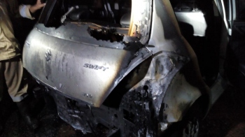 Parked car engulfs into flames at Thivim