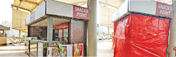 Airport officials cover snack counter emitting foul odour