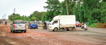 Poor service road, lack of streetlights, speed limit puts motorists at risk