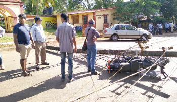 Electricity pole falls on moving bike; father, daughter escapes