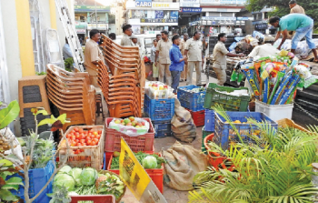 MMC confiscates footpath goods