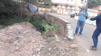 Hue & cry raised over construction material dump in St Inez creek