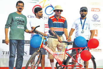Siddharth rides home on a brand new bicycle