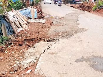 Portion of road caves in near Valpoi KTC
