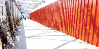 Metal sheets on old station road bridge in Margao pose danger to people, boon to anti-socials