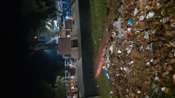 Dr Lohia stands in darkness, debris add further insult