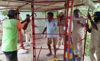 MMC razes down encroachment at Ravindra Bhavan Circle