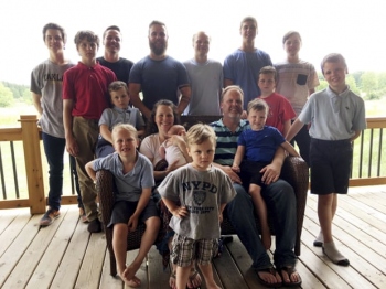 Fifteenth time's the charm! 14 boys later, Michigan couple finally welcomes baby girl