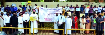 Jesuits of Goa Province protest in Belagavi, demand Fr Stan’s release