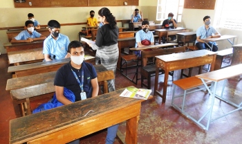 Std XII students experience dos & don’ts on Covid in Margao schools on Day 1