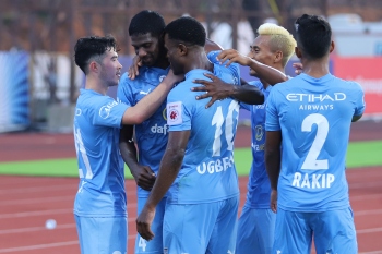 Clinical Mumbai brush past Odisha to go top