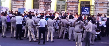 Police try to scuttle rally, protesters stand firm